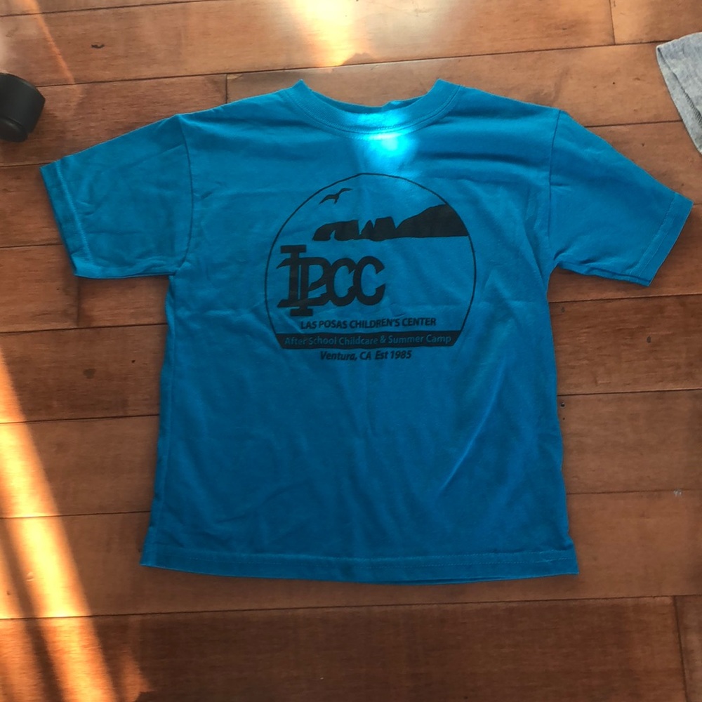 8 assorted kids t shirts.